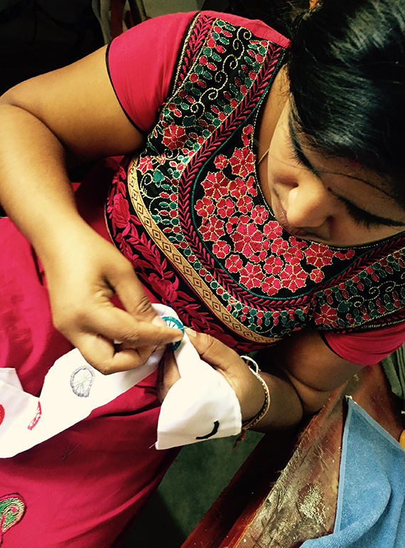 Gnadaa woman stitching